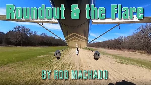 Aircraft viewed from below against a clear sky, moments before landing, featured in "roundout & the flare" by Rod Machado's Aviation Learning Center, covering aspects of takeoffs and landings according to ACS standards